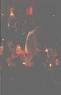 Brother Roger lighting candles at Evening Prayer (c) 2000 Ateliers et Presses de Taize